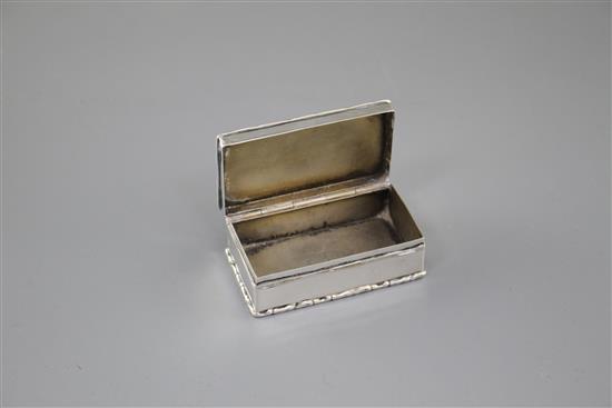 An Edwardian silver and enamelled cabochon set rectangular box and hinged cover, the enamel decorated with the bust of a lady